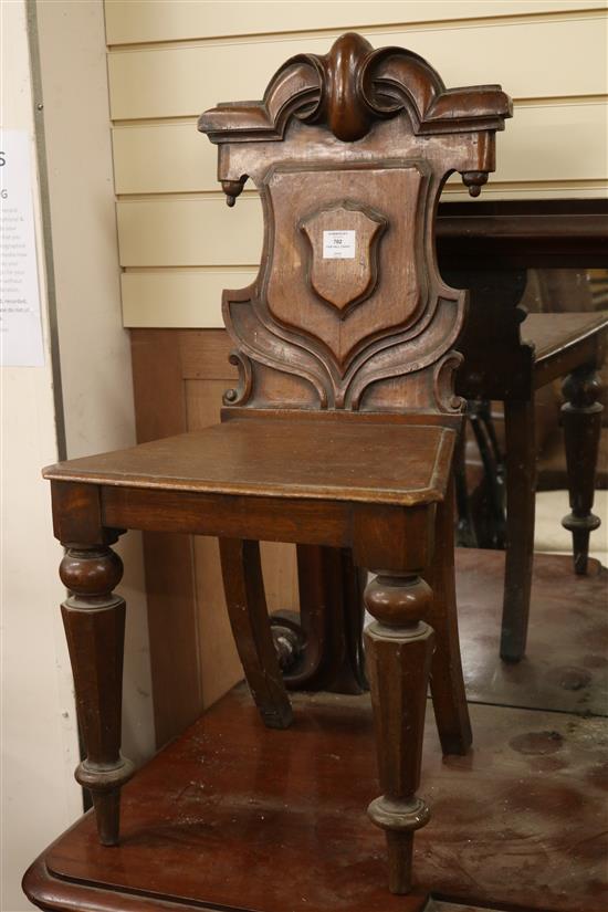 A pair of Victorian hall chairs